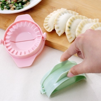 魔法の創造的な手動パック機械Food-gradeプラスチック台所用具はゆで団子を形成するつまむ