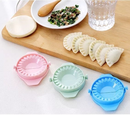 魔法の創造的な手動パック機械Food-gradeプラスチック台所用具はゆで団子を形成するつまむ