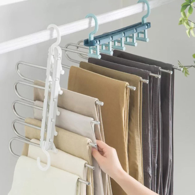 衣服のための棚を乾燥する家庭用品のスペース節約のプラスチック折るハンガー