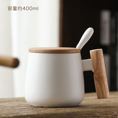 OEMの総本店400mlの陶磁器のティー カップはふたおよびスプーンによって襲う