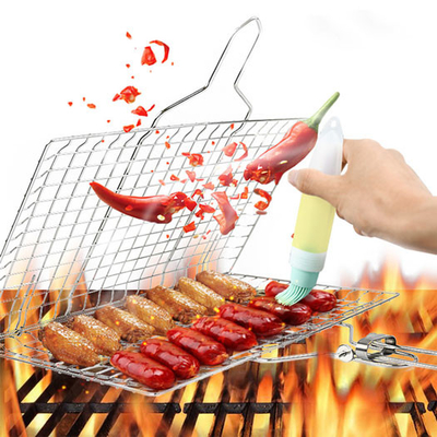 ハンドルが付いているグリルのバスケットを折るISO9001ステンレス鋼BBQの用具および付属品