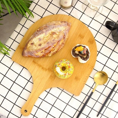 パン屋容易なグライドの端及びハンドルが付いている優れた自然なタケ ピザ皮板